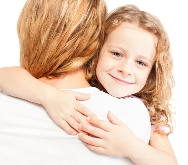 Child embracing mother Stock Picture