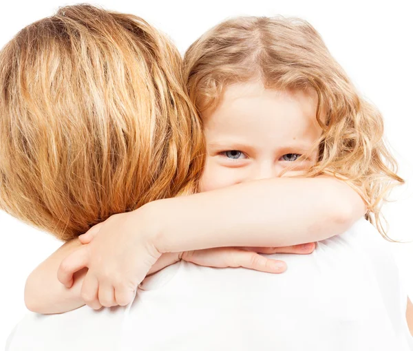 Child embracing mother Stock Picture