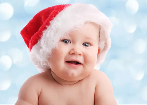 Baby in a Christmas hat — Stock Photo, Image