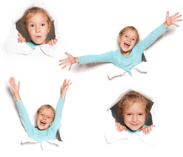 Kid looking out of a hole — Stock Photo, Image