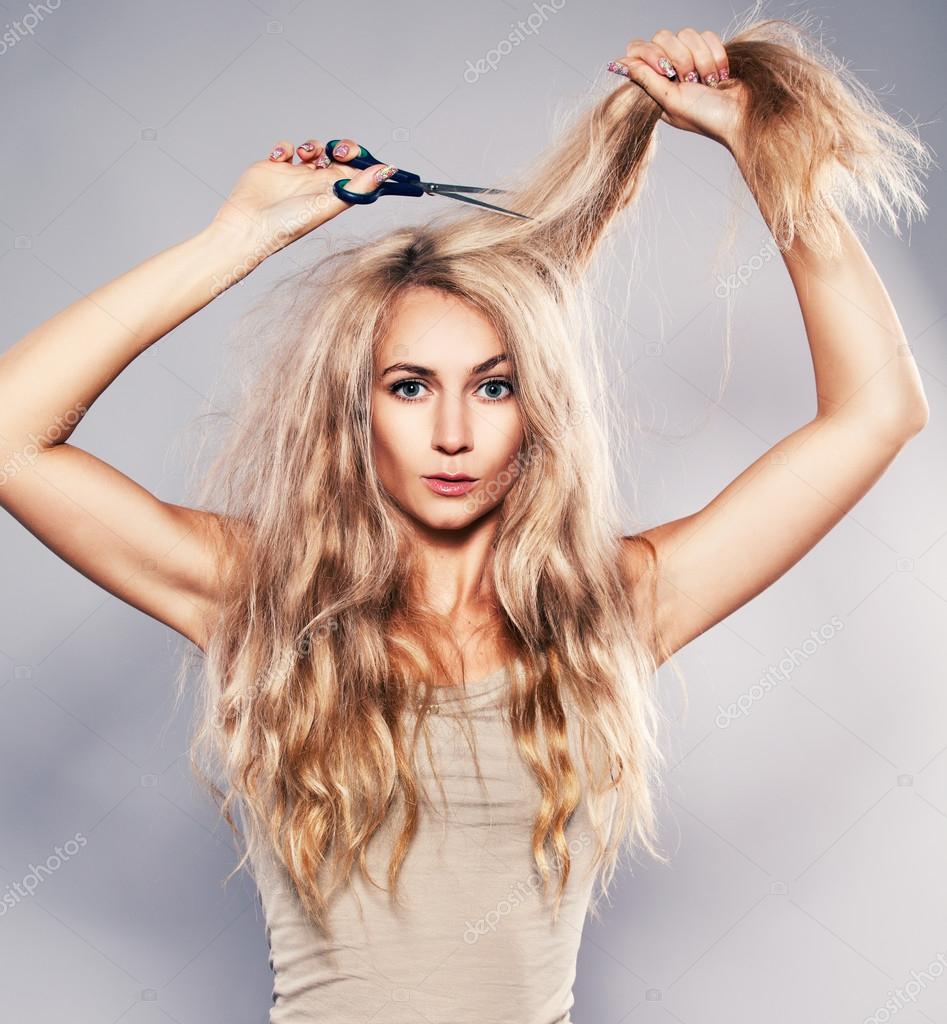 Woman Cut Her Hair Stock Photo TatyanaGl 62542793