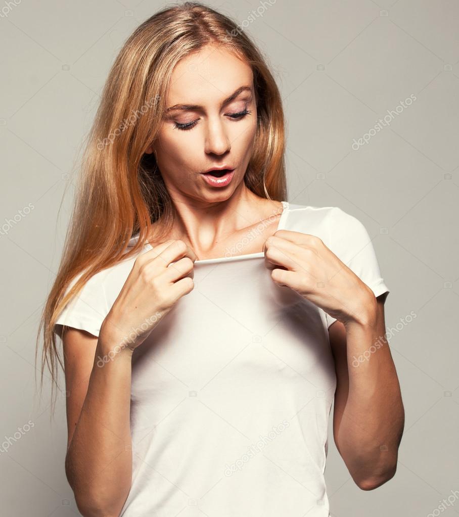 Woman with a surprised look on his chest