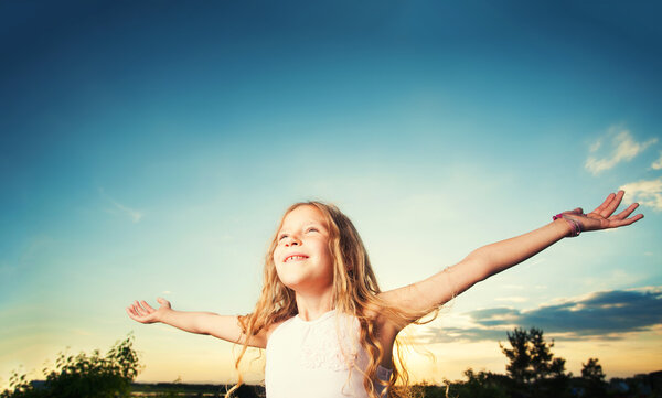 Child with arms outstretched