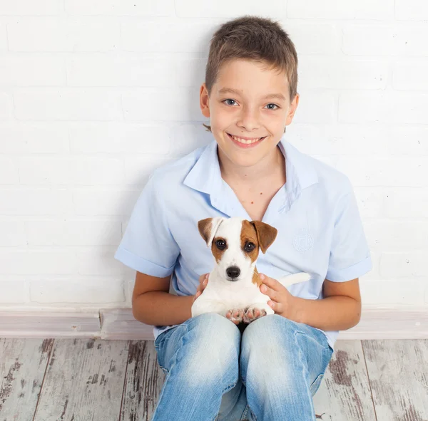 Boy with puppy — Stock Photo, Image