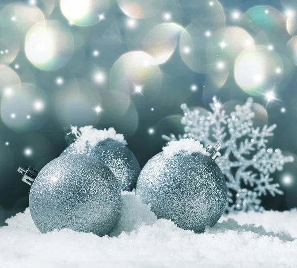 Christmas decoration on snow — Stock Photo, Image