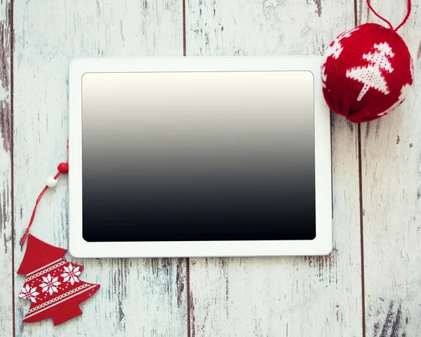 Noel arkaplanı üzerine tablet — Stok fotoğraf