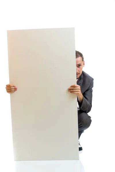 Suit tie businessman displaying placard — Stock Photo, Image