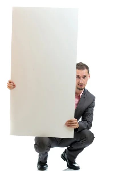 Suit tie businessman displaying placard — Stock Photo, Image