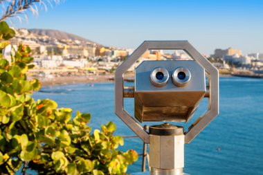 Tourist binoculars. Tenerife, Spain clipart