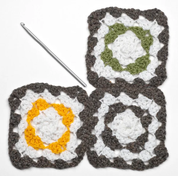 Knitted color pattern and crochet — Stock Photo, Image