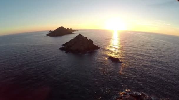 Flight over the sea and islands at sunset, Ajaccio area, Corsica, France. Archipel des Sanguinaires. Aerial panoramic view. — Stock Video