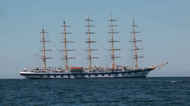 Large sailing ship with five masts anchored in the open sea. — Stock Video
