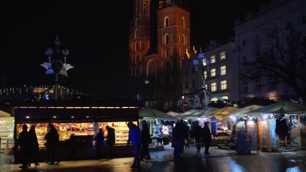 Рождественская ярмарка, главная площадь Кракова — стоковое видео
