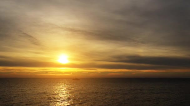 Sunset on the Baltic Sea. Baltic Sea (Ostsee) is a sea of the Atlantic Ocean, enclosed by Scandinavia, Finland, the Baltic countries, and the North European Plain. — Stock Video