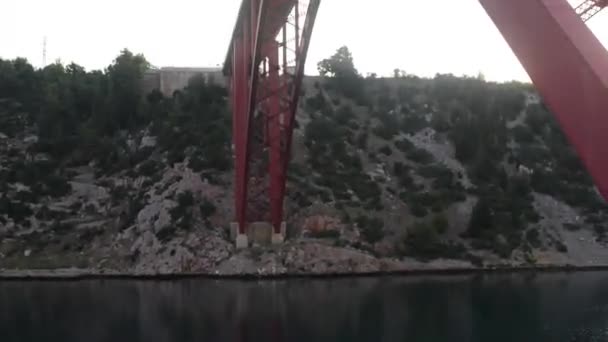 The Maslenica Bridge is a deck arch bridge carrying the D8 state road approximately 1 km to the west of the settlement of Maslenica, Croatia — Stock Video