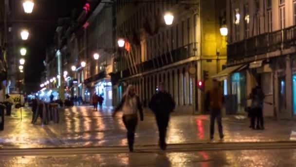 Lissabon, Portugal-Mart 23 2016: timelapse 4k: nacht Rua Augusta, Lissabon, Portugal. Lissabon ligt in het westelijke Iberische schiereiland aan de Atlantische Oceaan en de Taag. — Stockvideo