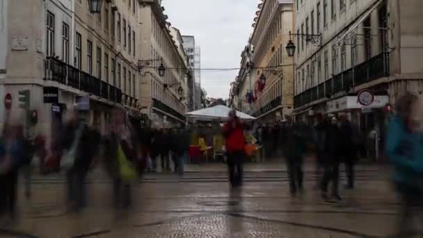 Lissabon, Portugal-Mart 23 2016: Timelapse 4K: Rua Augusta, Lissabon, Portugal. Lissabon ligger på västra Iberiska halvön på Atlanten och floden Tagus. — Stockvideo