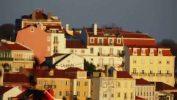 Transfer focus: old town of Lisbon. Lisbon is the capital and the largest city of Portugal, lies in the western Iberian Peninsula on the Atlantic Ocean and the River Tagus. — Stock Video