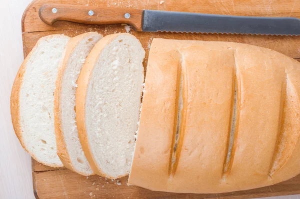 Loaf White Wheat Bread Knife Lying Old Wooden Cutting Board — Stock Photo, Image