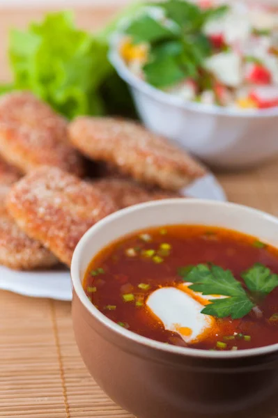 Delicious Red Borscht Sour Cream Pork Cutlets Breadcrumbs Crab Salad — Stock Photo, Image