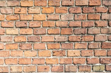 Eski tuğla kale yüzeyinin doku parçası, alçısız. Eski tuğla işi.