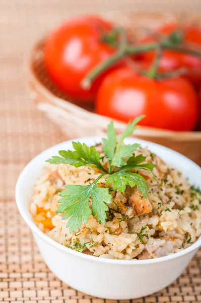 Pilaf Meat Rice Garnished Parsley Bamboo Table Cloth Red Tomatoes — Stock Photo, Image
