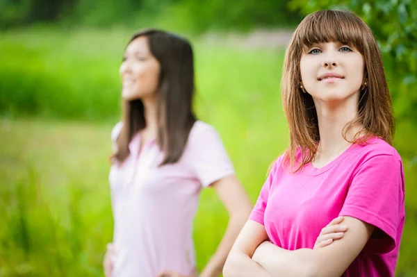 Two Smiling Beautiful Young Women Stand Background Green Summer Park Royalty Free Stock Photos