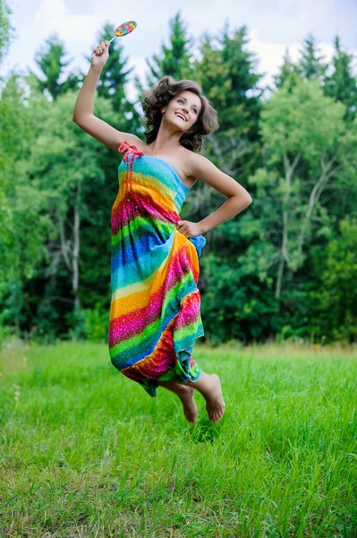 Young Charming Cheerful Woman Long Dark Curly Hair Multicolored Dress — Stock Photo, Image