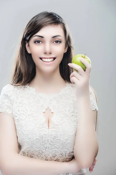Young Beautiful Girl Long Hair Holding Green Apple Grey Background — Stock Photo, Image
