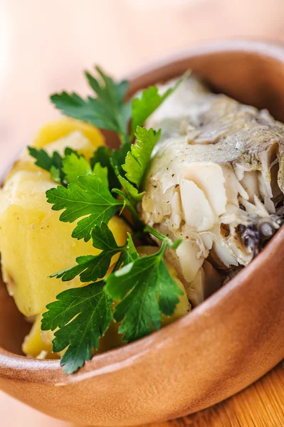 Fish with boiled potatoes and parsley — Stock Photo, Image