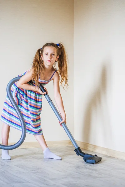 Small girl with vacuum cleaner — Stock Photo, Image