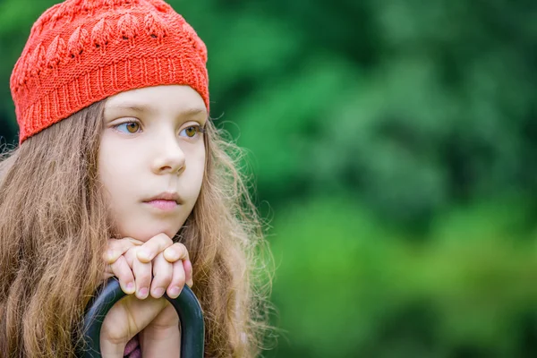 Little girl in thinking about the future — Stock Photo, Image
