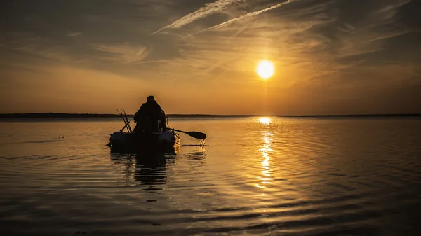 Fishermen in rubber boat — Stock Photo, Image