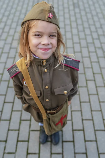 Small girl in Soviet military uniforms — Stock Photo, Image