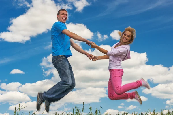 Young couple jumping Stock Photo