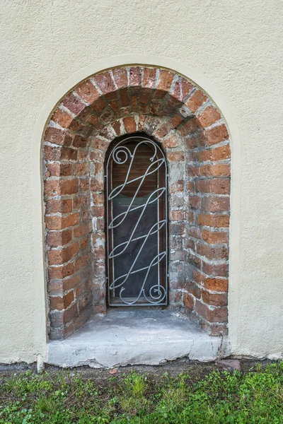 Window with wrought iron bars — Stock Photo, Image