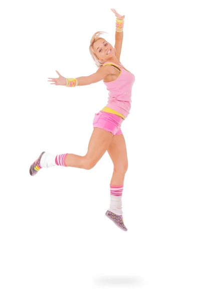 점프 하는 핑크 드레스에 젊은 여자 — 스톡 사진