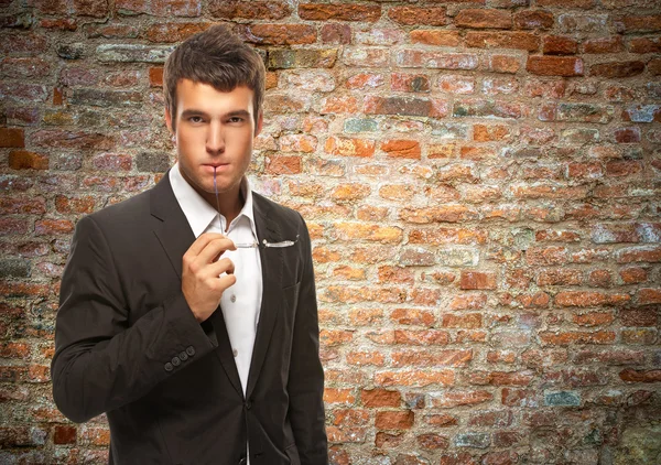 Young businessman thinking — Stock Photo, Image