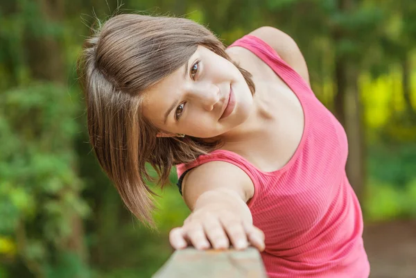 Girl at bridge hand-rail — Stock Photo, Image