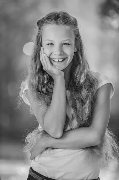 Smiling teenage girl in white blouse — Stock Photo, Image