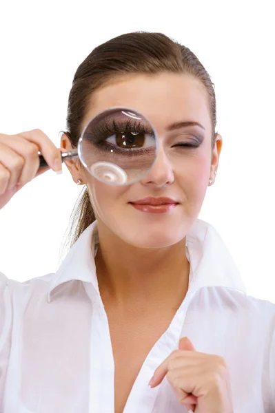 Woman holding magnifying glass Royalty Free Stock Photos