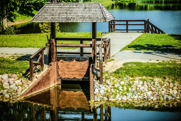 Wooden sluice — Stock Photo, Image