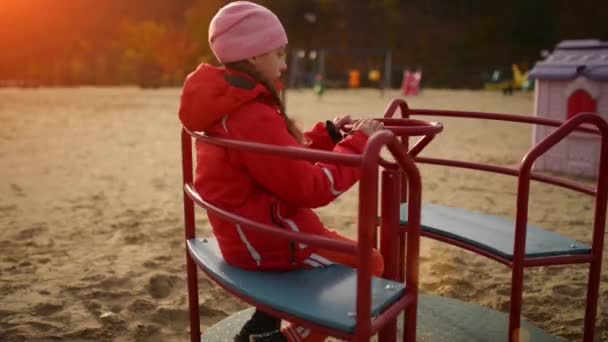Beautiful little girl on swing — Stock Video
