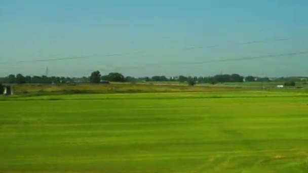 Train travels at a speed past — Stock Video