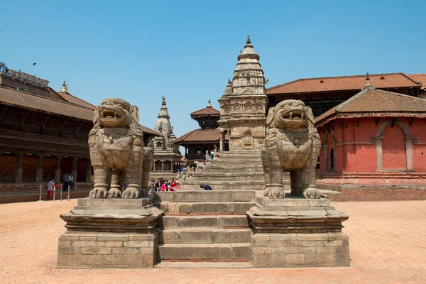 Stone lions gate on a Durbar square — Stock Photo, Image