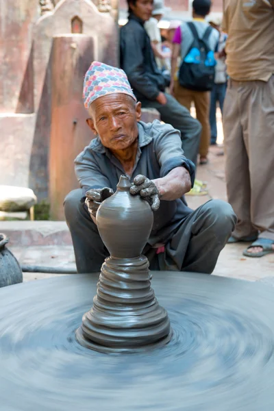 Unidentified pottery man — Stock Photo, Image