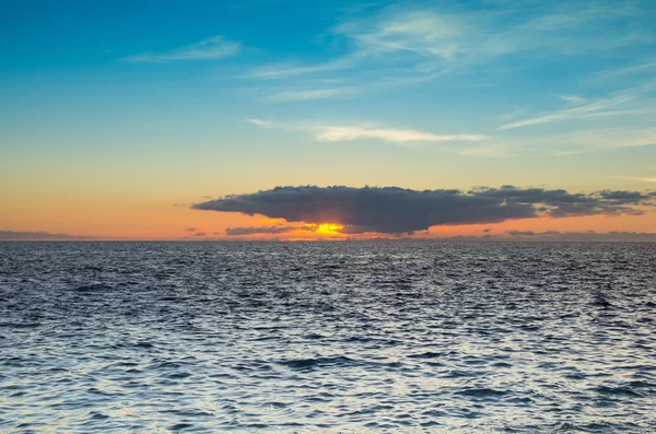 Sunset over the coast of Atlantic ocean — Stock Photo, Image