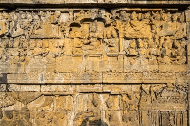 Endonezya 'nın merkez Java kentindeki 9. yüzyıl Mahayana Budist Tapınağı' ndaki Borobudur 'ta bir yardım heykeli. Burası dünyanın en büyük Budist tapınağı..