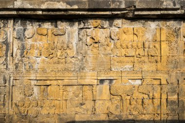 Endonezya 'nın merkez Java kentindeki 9. yüzyıl Mahayana Budist Tapınağı' ndaki Borobudur 'ta bir yardım heykeli. Burası dünyanın en büyük Budist tapınağı..