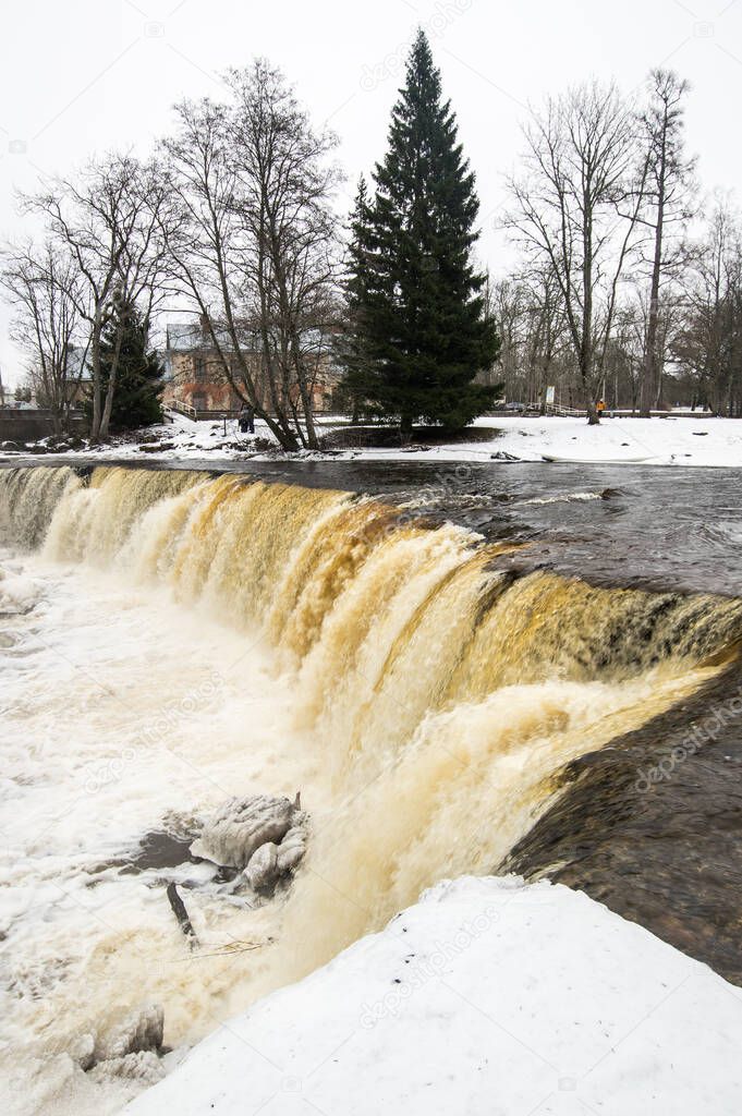 Partly frozen Keila-Joa waterfall in winter near Tallinn, Estonia
